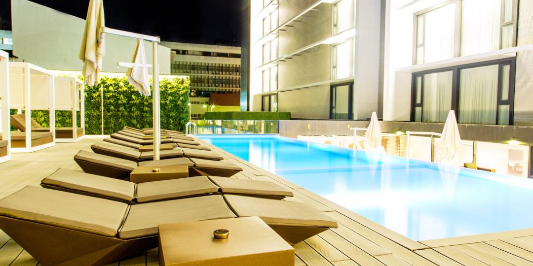 Relax in luxury by the poolside