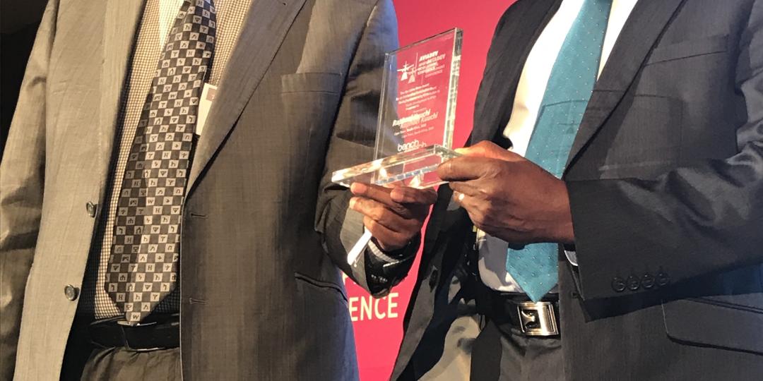 Former Ethiopian Airlines CEO and former RwandAir chairman, Girma Wake, presents IATA VP for Africa, Raphael Kuuchi, with a life-time achievement award at the AviaDev conference in Cape Town.