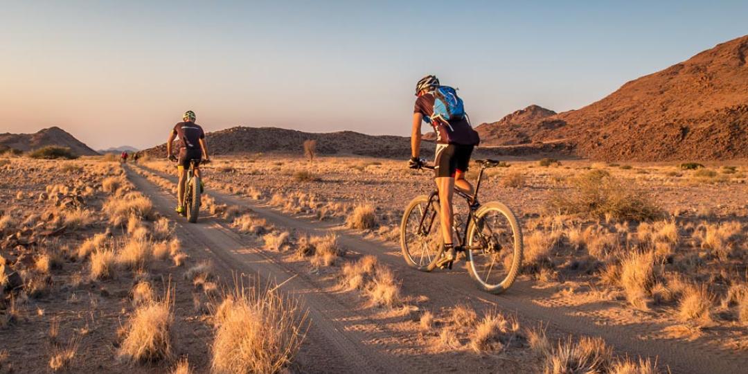 Visitors to Sossus Under Canvas can see some of Namibia’s best sights by bike. 