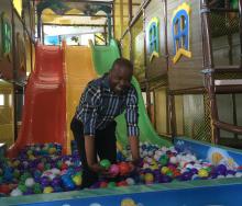 Head of Durban Tourism, Philip Sithole, in the ball pool at Durban’s new attraction, GO WiLD at the Wavehouse.