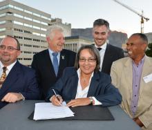 Deon Cloete (General Manager ACSA Cape Town International Airport), Alan Winde (Western Cape Minister of Economic Opportunities), Patricia De Lille (Executive Mayor of Cape Town), Tim Harris (CEO of Wesgro) and Enver Mally (Chairman of the Board of Cape Town Tourism) during the launch of Cape Town Air Access and the signing of the Memorandum of Understanding (MOU) between partners.