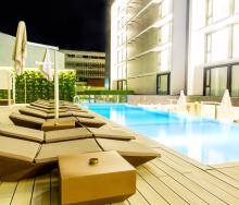 Relax in luxury by the poolside