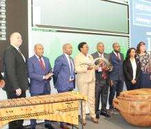 The Minister of Tourism opening trade at the JSE by blowing the kudu horn