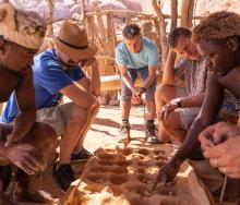 Guests interact with their hosts at Damara Living Museum 